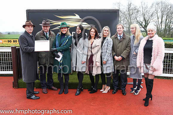 Jim Nicholson, Chairman of the Corporation of Horse Breeders, Noel Meade and his wife Derville, and Down Royal staff; Caroline Todd, Susan McCartney, Leah Beattie, Mike Todd Manager , Molly McCloskey