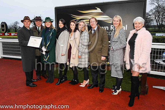Jim Nicholson, Chairman of the Corporation of Horse Breeders, Noel Meade and his wife Derville, and Down Royal staff; Caroline Todd, Susan McCartney, Leah Beattie, Mike Todd Manager , Molly McCloskey