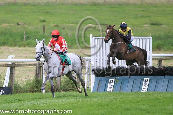 Race 1 winner - Roaring Potter ridden by Shane Fitzgerald in red colours with white diaamond, number 1