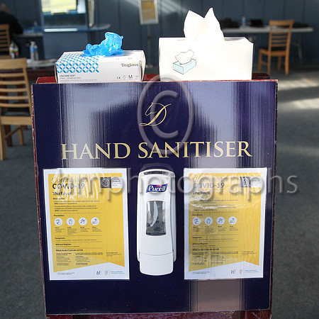 Sanitiser and instructions i the entrance to the press room at Downpatrick Racecourse on Randox Ulster National Raceday