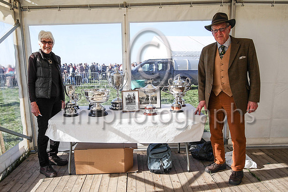 Hope Gardiner , Announcer and John Stewart Clerk of the Scales with the trophys at The Route Point to Pont at Portrush