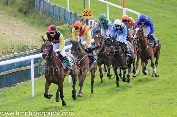 Lieutenant Highway(3, Black Red Star, Yellow Sleeces) ridden by Corey McGivern in the lead before goung on the win Race 5 at Downpatrick Races on 12th June 2022