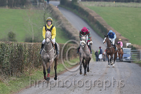 01st SIXTEEN AGAIN and M J O'Hare ( 13 , YELLOW,black chevron; yellow, plain sleeves; white  yellow check cap ) Trainer: B.P. Galvin,, Owner : Noreen Galvin on the way to the start