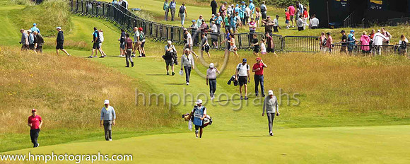 Keegan Bradley and Tommy Fleetwood on the 18th fairway on the second day of practice at the 2019 Open at Royal Portrush