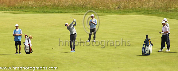 Tommy Fleetwood watched as Keegan Bradley hit to the 18th green on the second day of practice at the 2019 Open at Royal Portrush