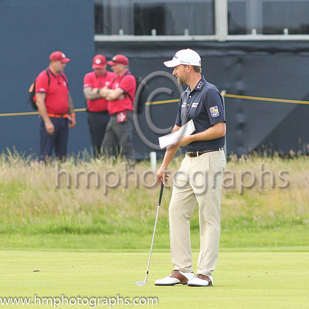Checking the yardage on the first fairway during practice at the 2019 Open at Royal Portrush