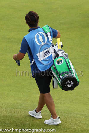 Jang's caddie on the 17th green on the second day of practice at the 2019 Open at Royal Portrush