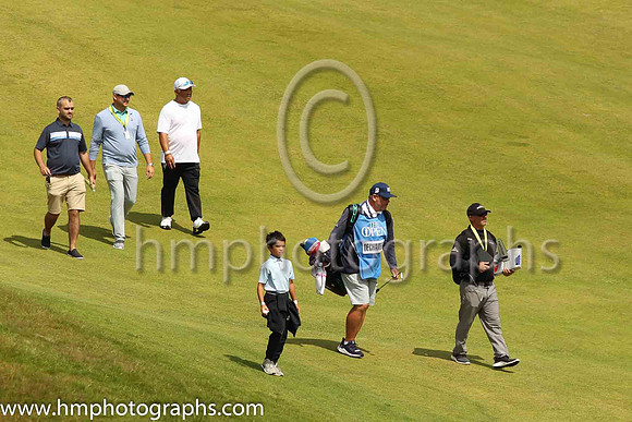 Bryson Dechambeau's entourage approaches the 17th green on the second day of practice at the 2019 Open at Royal Portrush