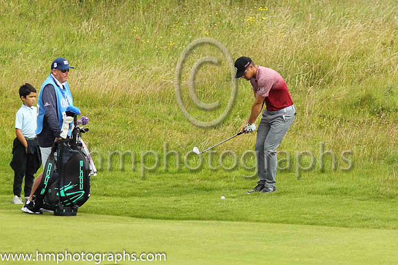 Bryson Dechambeau pitches to the 17th green on the second day of practice at the 2019 Open at Royal Portrush