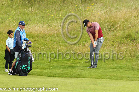 Bryson Dechambeau pitches to the 17th green on the second day of practice at the 2019 Open at Royal Portrush