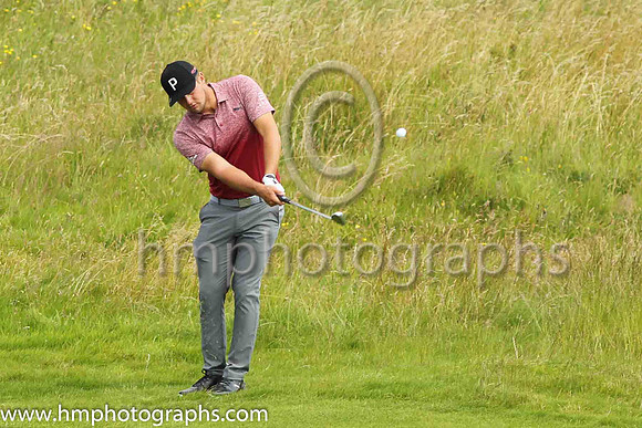 Bryson Dechambeau pitches to the 17th green on the second day of practice at the 2019 Open at Royal Portrush