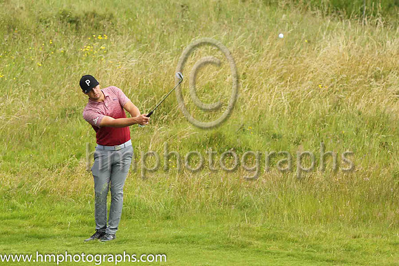 Bryson Dechambeau pitches to the 17th green on the second day of practice at the 2019 Open at Royal Portrush