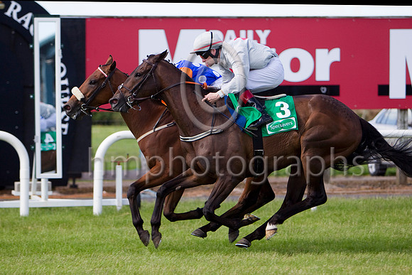 Celtic Dane (Orange Cap),  Jockey C D Haynes wins the Specsavers 2 For 1 Ulster Derby beating Northgate (Grey red star), Jockey P J Smullen  - CU2D0262-e3a4j