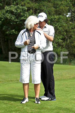 Rory McIlroy providing an unusual autograph at the 2010 Irish Open at Killarney - CU2D1492-e
