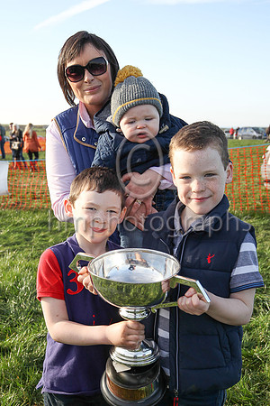 Laura McAleese, owner of Rossamilan winner of the Macauley Wray LLP Maiden Race for 6-Y-O and Upwards Geldings and Novice Riders at the Route P2P at Portrush , wife of trainer Paul McAleese and child