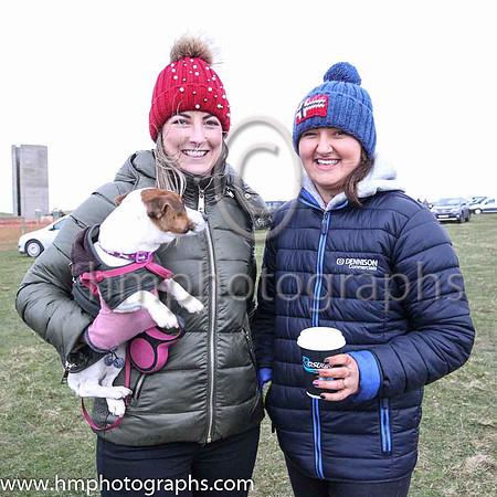 Natasha Mallon from Downpatrick with her Mini Jack Russell and friend Robyn McCluskey at the Tyrella Point to Point Steeplechases.