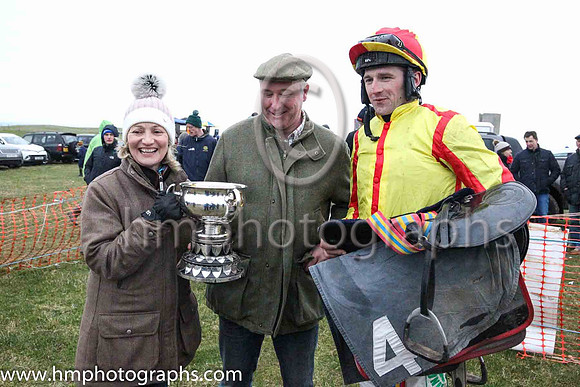 Stephen and Yvonne Pearson from Newtownards owners of Double Smart with jockey Declan Lavery in the parade ring after Double Smart won the memorial race sponsored by William McDowell and Stephen Magee