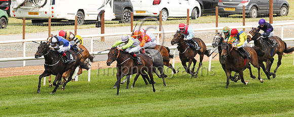 02nd That s Mad  and K J Manning ( 4 , blue, white spot ) Trainer - L Breen , Owner - Tommy s Boys Partnership