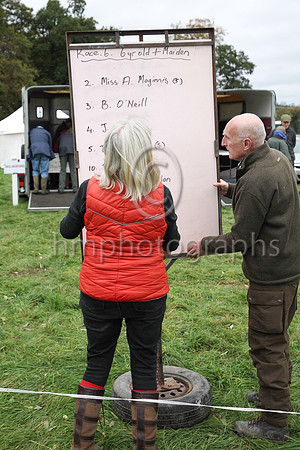 East Antrim Hunt officials update the starting list for the sixth race at the P2P at Loughanmore on 23rd October 2021