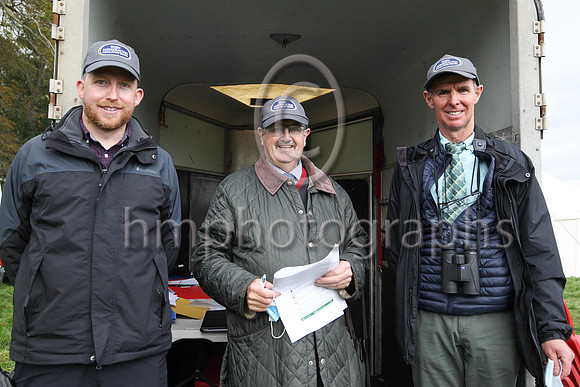 Alan Mahon, Frankie Fitzsimmons and Leo Gracey IHRB officials showing off the new IHRB cap at the East Down Hunt P2P at Loughanmore on 23rd October 2021