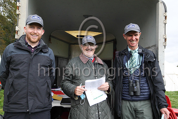 Alan Mahon, Frankie Fitzsimmons and Leo Gracey IHRB officials showing off the new IHRB cap at the East Down Hunt P2P at Loughanmore on 23rd October 2021