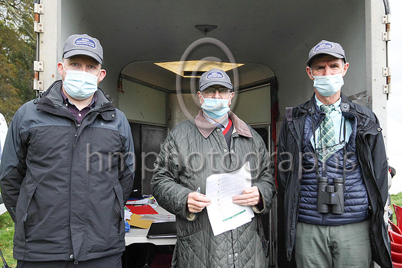 Alan Mahon, Frankie Fitzsimmons and Leo Gracey IHRB officials showing off the new IHRB cap at the East Down Hunt P2P at Loughanmore on 23rd October 2021