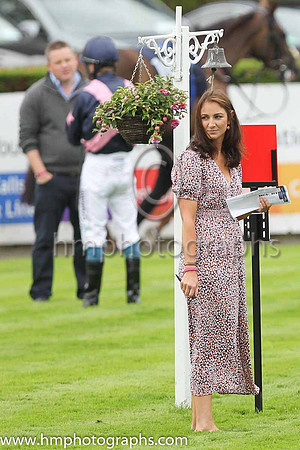 Susan McCartne,y Hospitality Manager at Down Royal organising things in the parade ring on BoyleSports Derby Day
