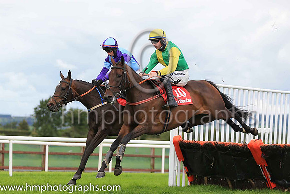 06th Scarlet Rebel and J J Slevin ( 11 , light blue and dark blue qtrs ) Trainer - Caroline Mccaldin , Owner - Alan McCaldin