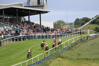 Race 3 Winner Hurricane Georgie ridden by Corey McGiven - coulours black, mauve panel number 1