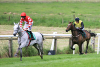 Race 1 winner - Roaring Potter ridden by Shane Fitzgerald in red colours with white diaamond, number 1