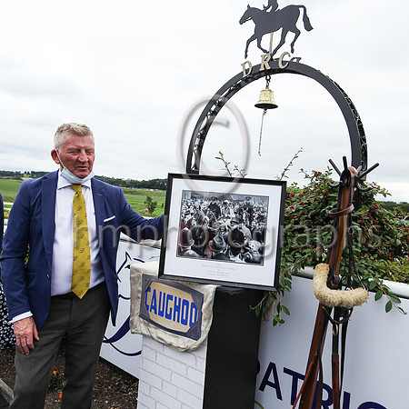 Richard Lyttle, Racecourse Manager at Downpatrick Racecourse with a photograph of Caughoo being led into the wnners enclosure in 1947 after winning the Aintree Gr and National.also in the picture is t