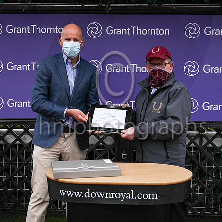 Richard Gillan , Managing Partner of Grant Thornton  and Derry Nolan representing winning trained M Halford after AnyoneCanHAveItAll won the Grnht Thornton H andicap Ulster Cesaarewitch H andicap at D