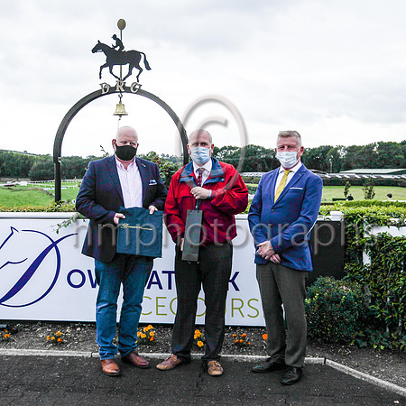 Willie Kelly (centre) receiving a presentation from Peter Magill  and Richard Lyttle Downpatrick Racourse Manager. Wille has retired after 41 years as an on-course bookmaker with Pat O'Hare.