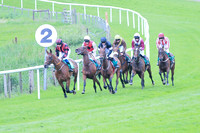 Race 3 Winner Hurricane Georgie ridden by Corey McGiven - coulours black, mauve panel number 1
