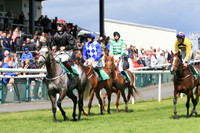 Race 4 Winner Dollar Value ridden by Mark McDonagh trained by T G McCourt - colours black, red and white cap number 1
