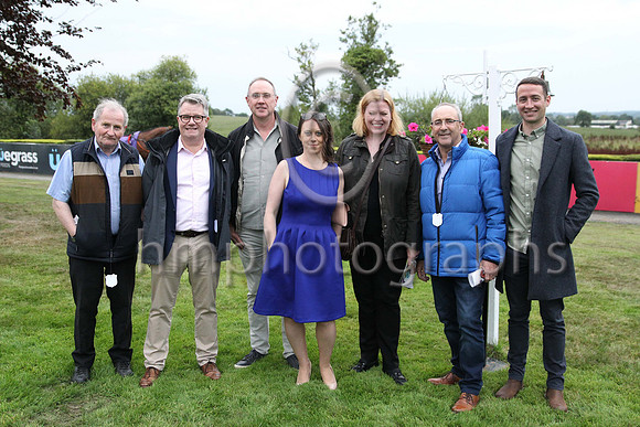 Owners in the parade ring before the Grant Thornton Handicap at Down Royal on 2nd September 2022