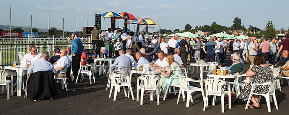 Spectators enjoyning the sunshine at Down Royal on 27th August 2021