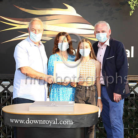 Franco Hughes in the winners enclosure with the Gleeson family after their horse Hi Stranger won the Franco Hughes Away Bet Mares race at Down ROyal on 27th August 2021.