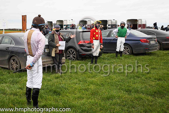 Turf club official Frankie Fitzsimmons briefing jockeys before the start of Portrush P2P
