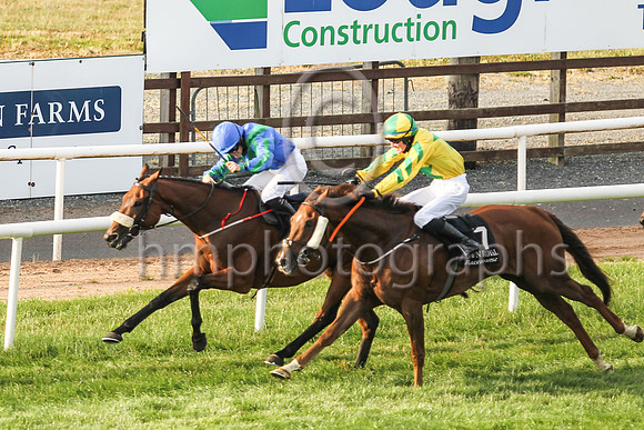 New Sodiety and Sorcha Woods (1, royal blue, emerald green chevron ) in the lead to win the Molson Coors Beverage Company Apprentice Handicap at Down Royal on Friday 23rd July 2021
