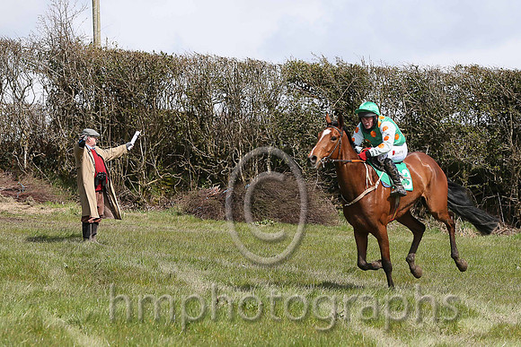Franjie Fitzsimmons guides R james and Welsh's Castle around the final fence