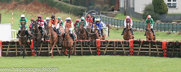 fell Arctic Warrior and M P Walsh ( 7 , orange  and green hoops ) Trainer - W P Mullins , Owner - John P McManus