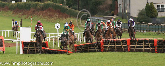 fell Arctic Warrior and M P Walsh ( 7 , orange  and green hoops ) Trainer - W P Mullins , Owner - John P McManus
