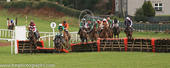 fell Arctic Warrior and M P Walsh ( 7 , orange  and green hoops ) Trainer - W P Mullins , Owner - John P McManus