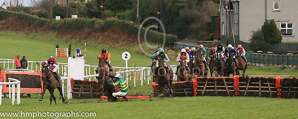 fell Arctic Warrior and M P Walsh ( 7 , orange  and green hoops ) Trainer - W P Mullins , Owner - John P McManus