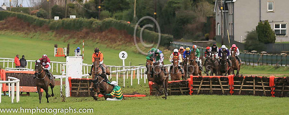 fell Arctic Warrior and M P Walsh ( 7 , orange  and green hoops ) Trainer - W P Mullins , Owner - John P McManus