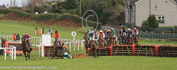 fell Arctic Warrior and M P Walsh ( 7 , orange  and green hoops ) Trainer - W P Mullins , Owner - John P McManus