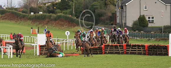 fell Arctic Warrior and M P Walsh ( 7 , orange  and green hoops ) Trainer - W P Mullins , Owner - John P McManus