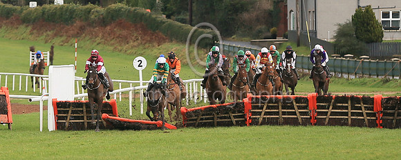 fell Arctic Warrior and M P Walsh ( 7 , orange  and green hoops ) Trainer - W P Mullins , Owner - John P McManus