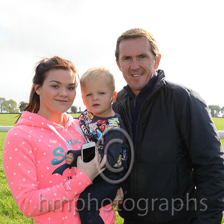 Young fan Ronan Smith and mum Danielle from Dunloy with Tony McCoy at the Mid Antrim Hunt Point to Point at Moneyglass near Toomebridge